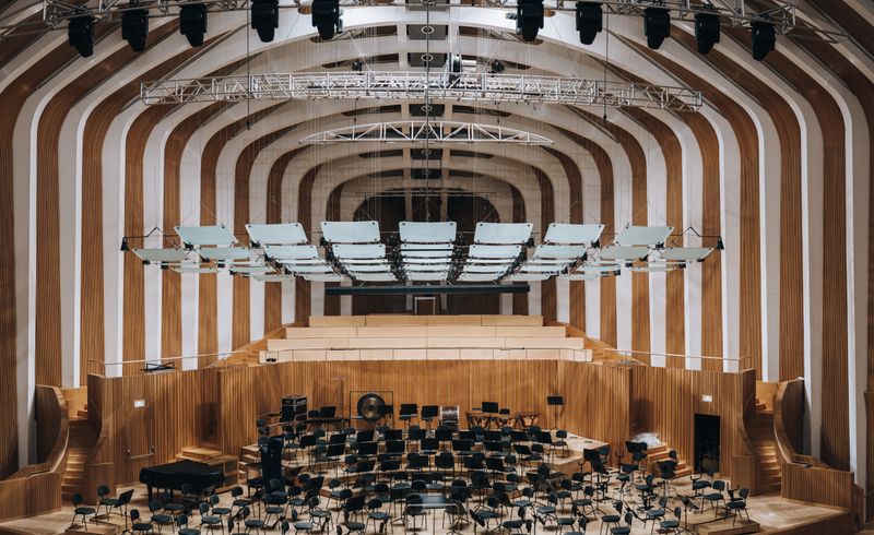 Auditorium with custom wood acoustic wall paneling