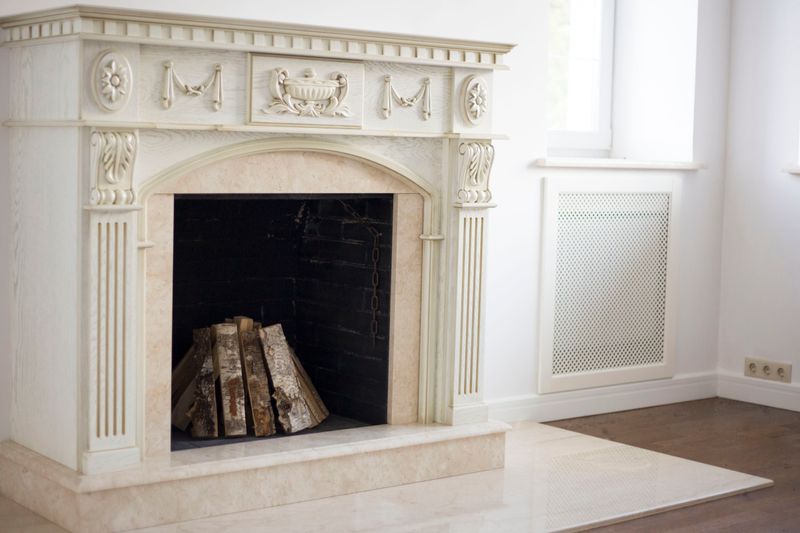 Custom carved fireplace mantel with detailed millwork