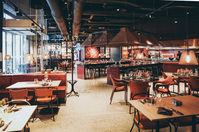 Restaurant interior with custom tables and booth seating
